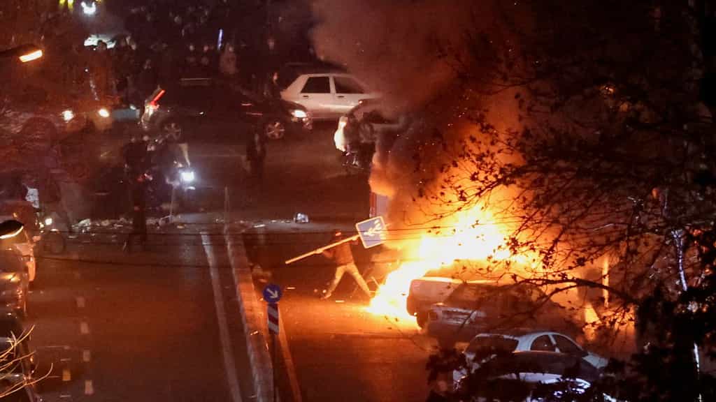 Trump announces new tariff on countries trading with Iran as number killed in protests rises